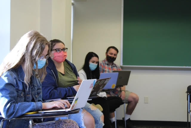 student talking in class